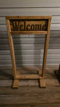 Personalized wooden hanging plant stand in a stained wood finish, handmade in West Virginia