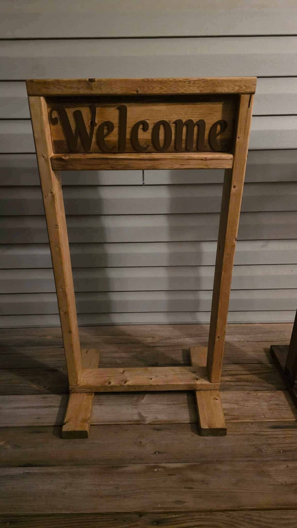 Personalized wooden hanging plant stand in a stained wood finish, handmade in West Virginia