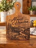 Almost Heaven West Virginia laser engraved wooden cutting board with mountain and forest scenery