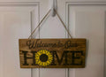 Welcome to Our Home wooden sunflower hanging sign